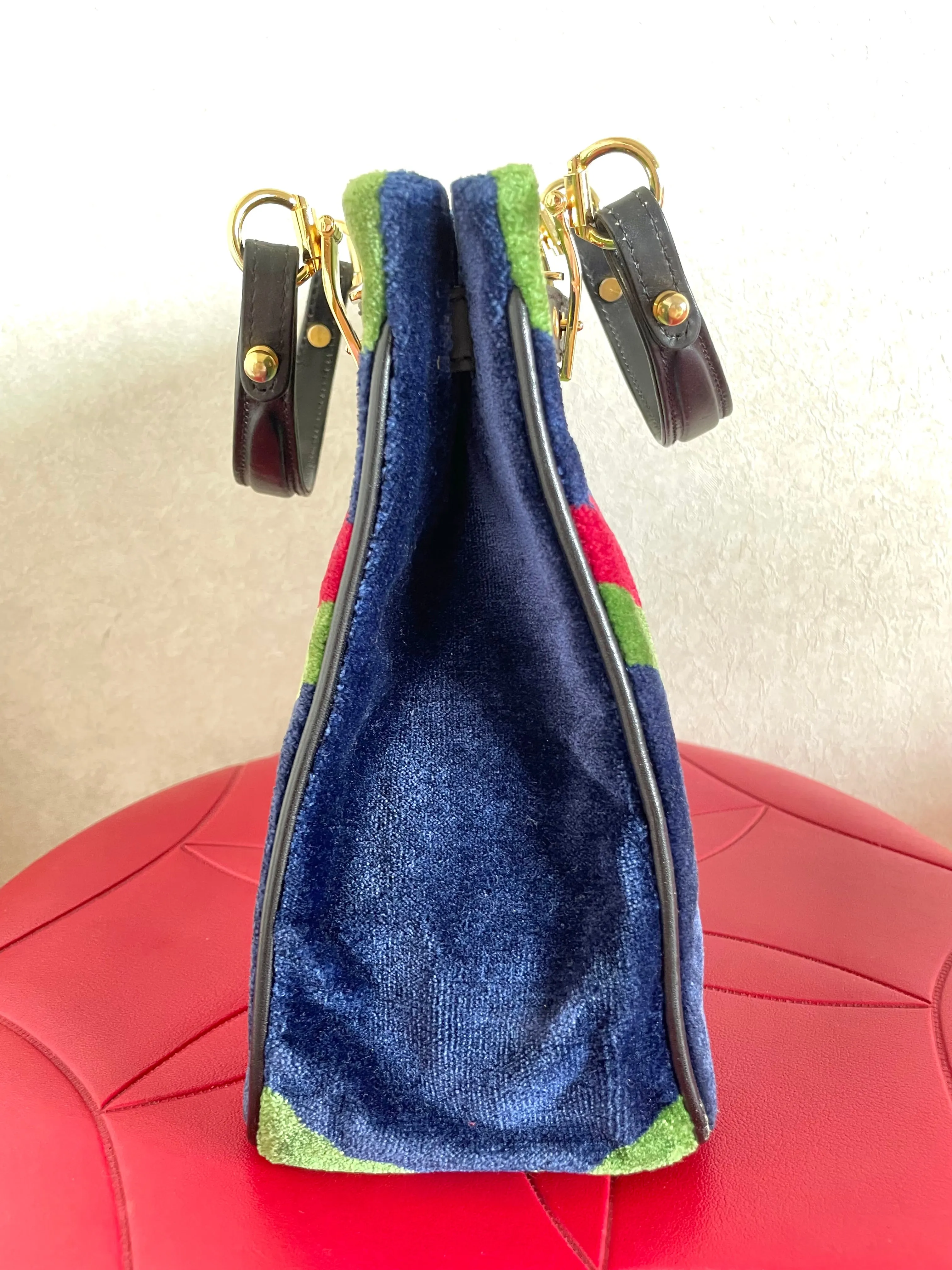 Vintage Roberta di Camerino navy, green, and red thunder chevron velvet weaving doctor bag with buckle strap leather handles. 0406221